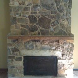 Living Room Fireplace After work:  Tin Cut Natural Stone